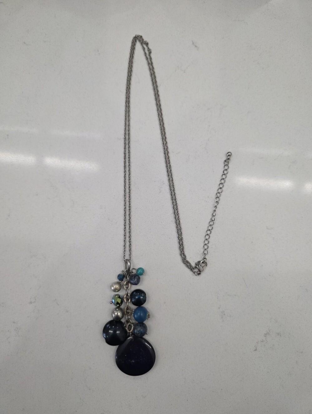 Silver Brand Teardrop Pendant 3.5" Necklace with Blue Beads Long Chain 15"